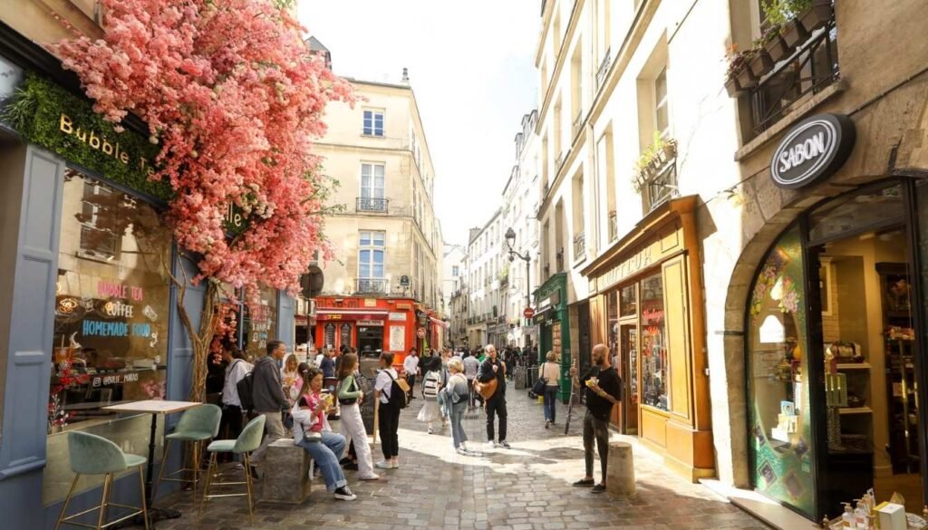 A bustling Parisian street, with historic buildings lining the sidewalks, bathed in warm, golden afternoon light. In the foreground, a group of people stand in front of a charming train station, their luggage and excited expressions suggesting a journey about to begin. Intricate wrought-iron details and ornate architecture frame the scene, creating a sense of timeless European elegance. The middle ground is filled with the rhythmic flow of pedestrians and vehicles, each with their own story to tell. In the background, the iconic Eiffel Tower rises majestically, a symbol of the city's enduring allure. The overall atmosphere evokes a sense of planning, exploration, and the promise of adventure that awaits those who navigate the passages of this vibrant metropolis. Como Economizar em Paris. Comece com o Planejamento